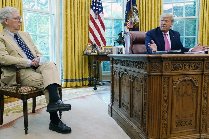 Senate Majority Leader Mitch McConnell, R-Ky., with President Trump at the White House. The Republican Party has unveiled a new pandemic relief bill, but tough negotiations lie ahead with Democrats.