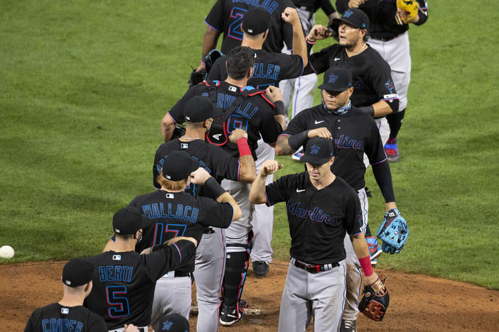 The Miami Marlins celebrate their Opening Day win against the Philadelphia Phillies last week at Citizens Bank Park in Philadelphia.