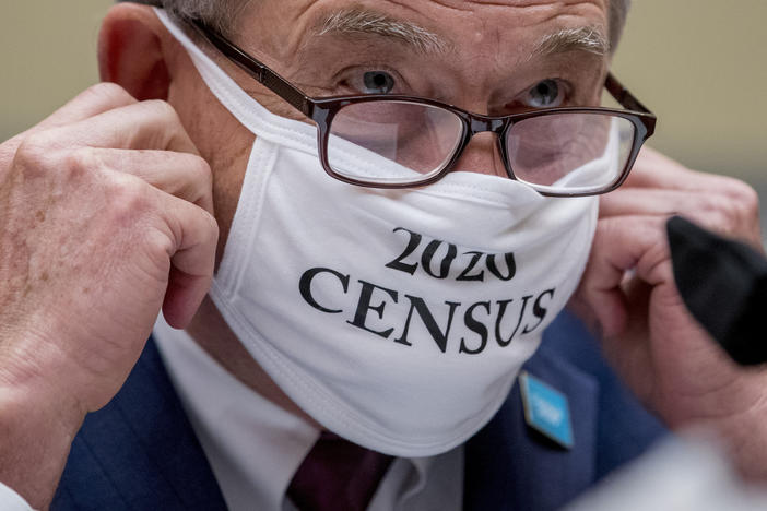 Census Bureau Director Steven Dillingham, wearing a face covering printed with the words "2020 Census," testified before the House oversight committee Wednesday that the bureau plans to finish counting "as soon as possible" despite career officials previously saying they need until Oct. 31 to finish a complete national head count.