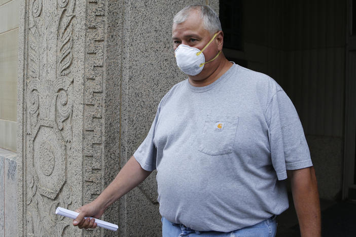 State Rep. Larry Householder, pictured leaving the federal courthouse after an initial hearing on July 21, was removed and replaced as Ohio House Speaker following his indictment on Thursday.