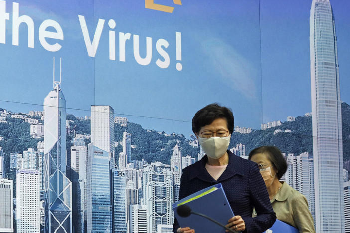 Hong Kong Chief Executive Carrie Lam, shown here arriving for a news conference in Hong Kong on Friday, is delaying the region's legislative elections by a year.