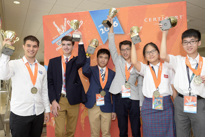 Gold medal winners Georgi Boshev, Ryan Catalfu, Ka Hei Chao, Kuan Hou Lei, Lai Tin Ming and Pak Hei Lee show off their trophies during the Pearson VUE Certiport Microsoft Office Specialist World Championship in 2016. The 2020 World Championships were cancelled due to the COVID-19 pandemic.