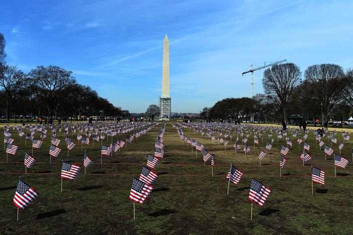 Some 1,892 American flags are installed on the National Mall in Washington, DC in 2014. The Iraq and Afghanistan veterans installed the flags to represent the 1,892 veterans and service members who committed suicide this year as part of the "We've Got Your Back: IAVA's Campaign to Combat Suicide."