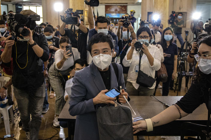 Maria Ressa, CEO of the Rappler news site, leaves a Philippine regional trial court after being convicted for cyber libel on June 15. Ressa, a veteran journalist and outspoken critic of President Rodrigo Duterte, is the focus of <em>A Thousand Cuts, </em>a documentary to be released virtually in the U.S. on Aug. 7.