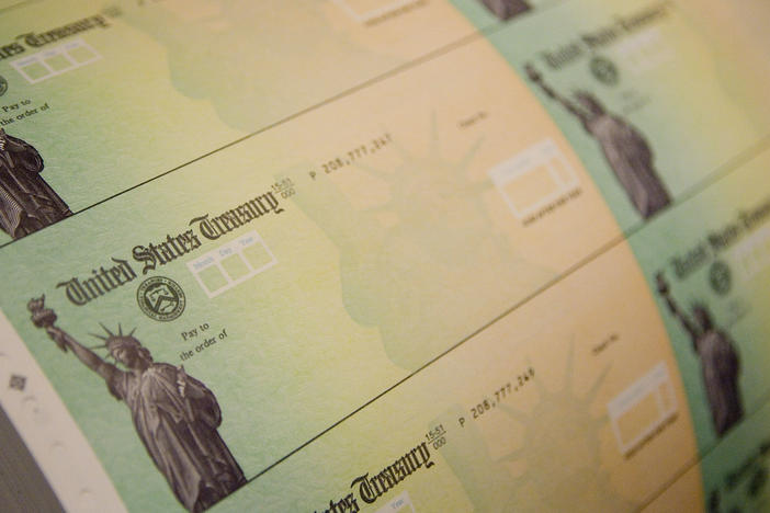 Stimulus checks are prepared on May 8, 2008, in Philadelphia. In 2020, stimulus checks again went to many Americans, this time during the pandemic's economic fallout. Some of that money went to thousands of foreign workers not eligible to receive the funds.