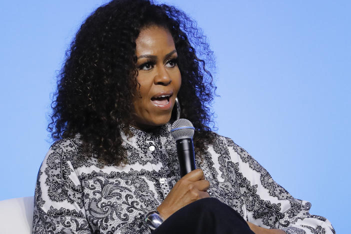 Michelle Obama said on her podcast that she's been having trouble sleeping and has been feeling depressed. "Spiritually, these are not ... fulfilling times," she said. Obama is seen here in December 2019.