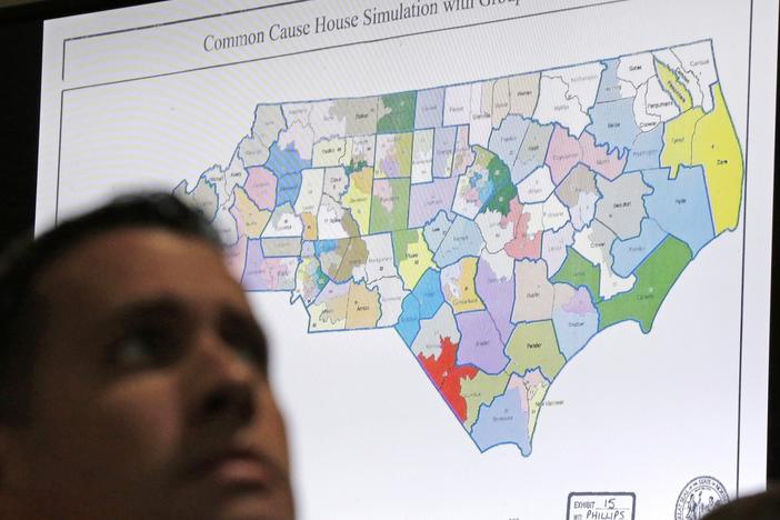 A North Carolina map is shown in Wake County Superior Court during a 2019 redistricting trial. Republicans and Democrats are preparing for a battle of state legislative supremacy that could have a big effect on political power for the next decade.