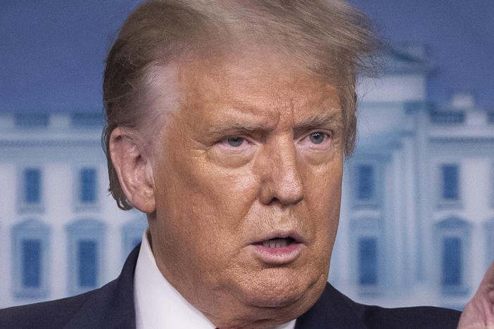 President Trump speaks during a briefing with reporters at the White House on Monday.