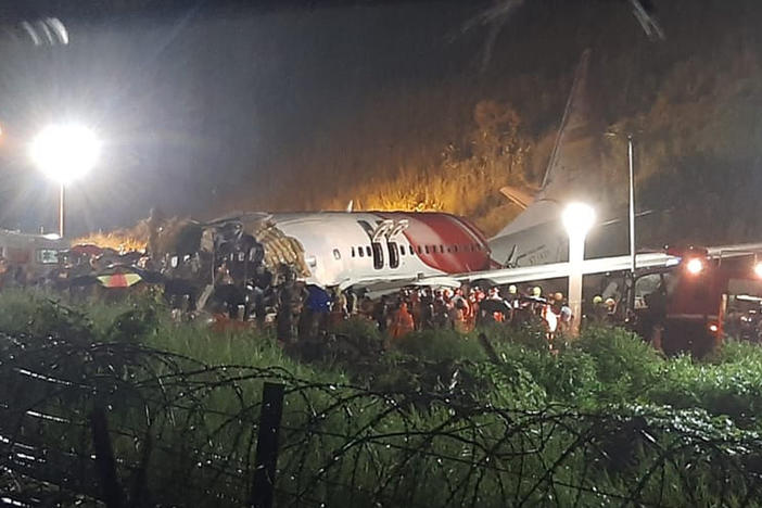 The wreckage of an Air India Express flight after it skidded off a runway Friday night at Kozhikode International Airport in the Indian state of Kerala.