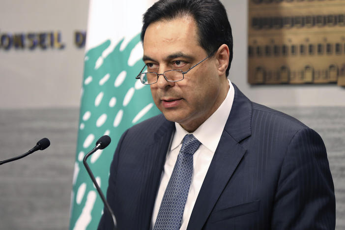 Former Lebanese Prime Minister Hassan Diab gives a speech in Beirut in March. Diab announced his resignation days after a disastrous explosion rocked Beirut.