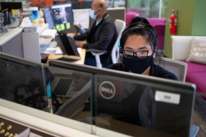 Harris County Public Health contact tracers are seen at work as they try to help stop the spread of the coronavirus outbreak in Houston, Texas, on July 22.