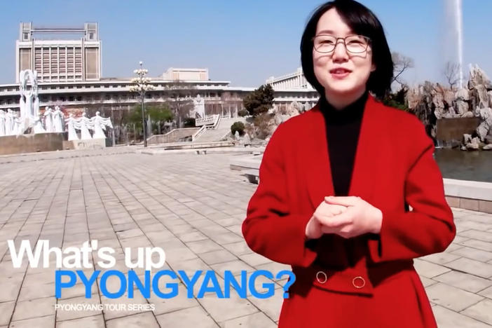 A woman named Un A leads viewers on a tour of the North Korean capital, Pyongyang, in a recent YouTube video. "Every building in Pyongyang is going through general cleaning to shake off winter dust," she says in English.