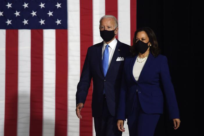 Presumptive Democratic presidential nominee Joe Biden and his vice presidential running mate, Sen. Kamala Harris, arrive to conduct their first appearance together in Wilmington, Del., on Wednesday.