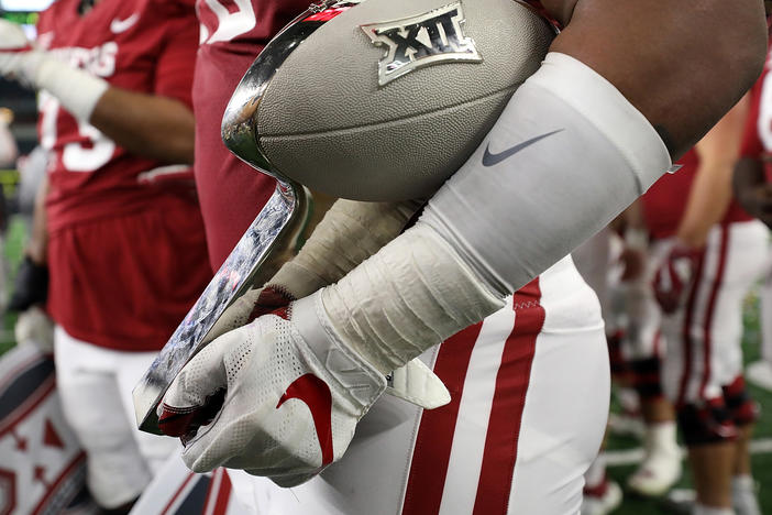 The Big 12 says its schools will start playing their conference games in late September, under a schedule that's been reduced due to the coronavirus. The conference hopes to hold a championship game in December.