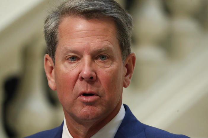 Georgia Gov. Brian Kemp, pictured last month, withdrew litigation against Atlanta Mayor Keisha Lance Bottoms and the City Council over a  requirement to wear masks in public and other restrictions related to the COVID-19 pandemic.
