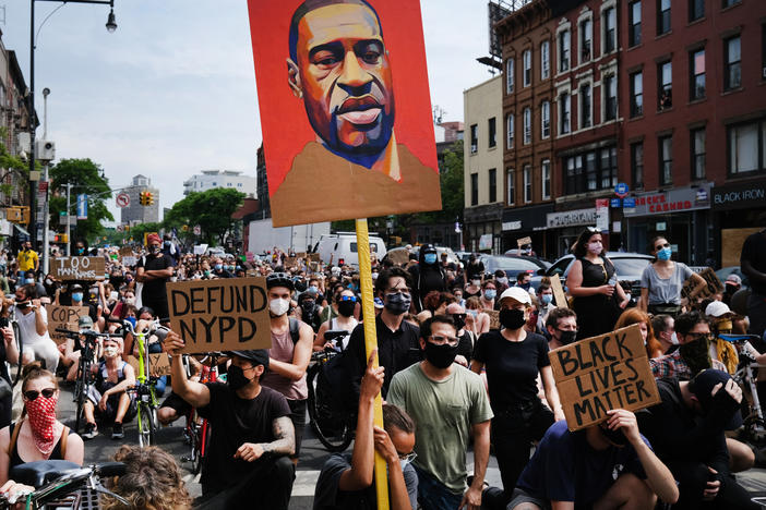 Protesters march in downtown Brooklyn over the killing of George Floyd by a Minneapolis Police officer on June 5, 2020 in New York City.