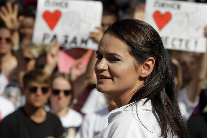 Svetlana Tikhanovskaya, candidate for Belarus' presidential election, smiles as she speaks to people during a meeting in her support in Brest, Belarus, on Aug. 2.