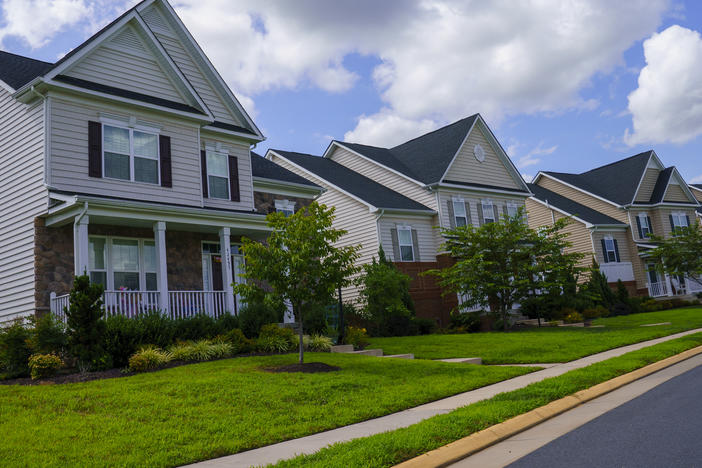 The Federal Reserve has helped push interest rates to record lows, which allows millions to consider refinancing. But a new fee from Fannie and Freddie could introduce an obstacle, critics say.