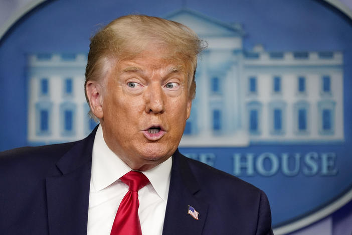 President Trump's amplification of a false "birther" conspiracy against Sen. Kamala Harris has been criticized.