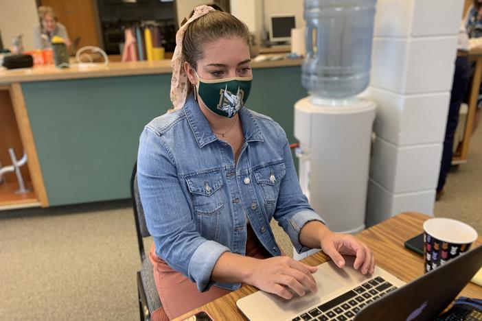 Third grade teacher Maya Davis attends training before her school district reopens.