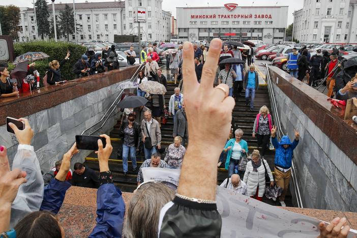 Protesters gather in front of the Minsk Tractor Works Plant to support workers leaving the plant after their work shift in Minsk, Belarus, on Wednesday.