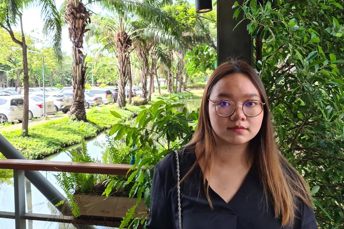 Panusaya Sithijirawattanakul, who read a politically charged manifesto at a rally last week, outside Thammasat University on Tuesday.