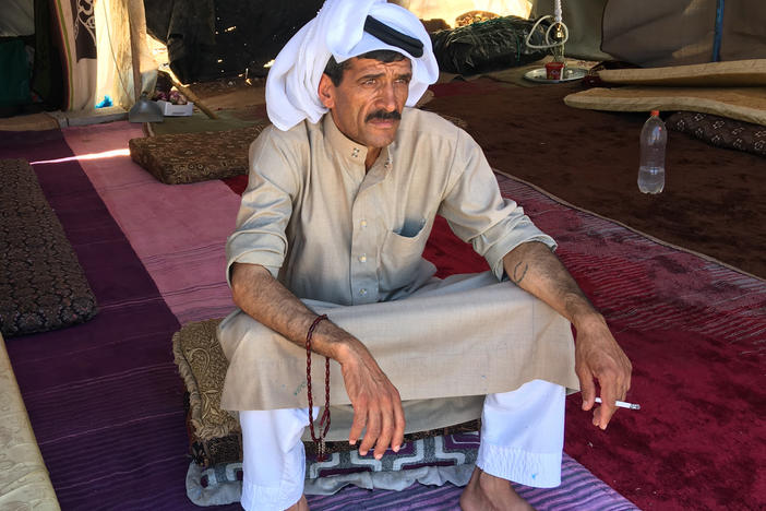 Syrian refugee Mohammad al-Saleh near Amman. He and his wife are farm laborers and were working in the fields when their tent caught fire in June, killing their four youngest children.
