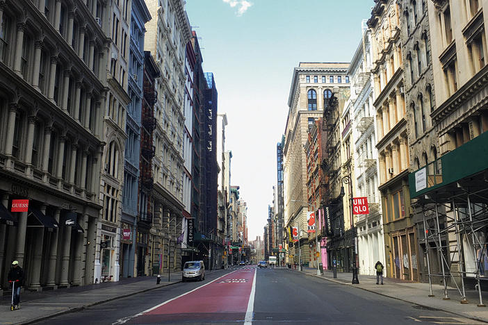 Empty offices sit above empty retail stores on Broadway in downtown Manhattan. As commercial real estate continues to lie vacant around the U.S., it may contribute to a vicious economic cycle that reshapes our cities.