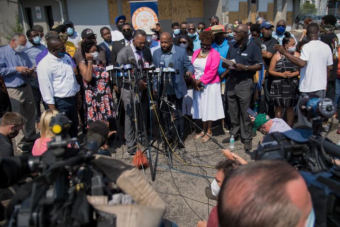 The Rev. Jesse Jackson spoke at a press briefing Thursday in Kenosha, Wis., in the parking lot of Bert and Rudy's Auto Service, where two protesters were shot and killed Tuesday night.