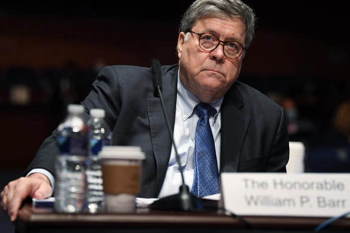 Attorney General William Barr, seen here before the House Oversight Committee, has been making a political case for the president even as he serves in the administration.