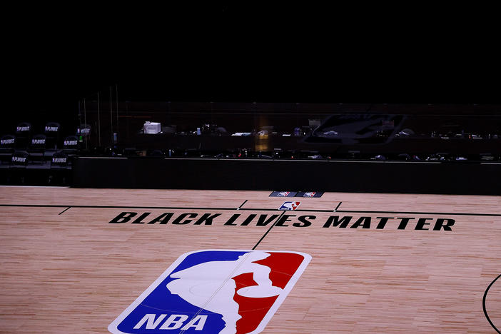 An arena is empty Thursday at the ESPN Wide World Of Sports Complex near Orlando, Fla., as all the NBA playoff games were postponed. The games are set to resume Saturday.