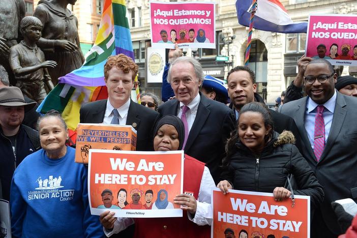 U.S. Rep. Joe Kennedy III (D-Mass.), center left, and  Sen. Edward Markey (D-Mass.), center right (R) during a 2017 protest against Trump administration immigration policies. The two lawmakers face each other in a Democratic primary this Tuesday.