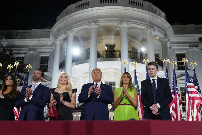 From left, Kimberly Guilfoyle, Donald Trump Jr., Tiffany Trump, President Trump, first lady Melania Trump and Barron Trump stand on the South Lawn of the White House on the last night of the Republican National Convention.