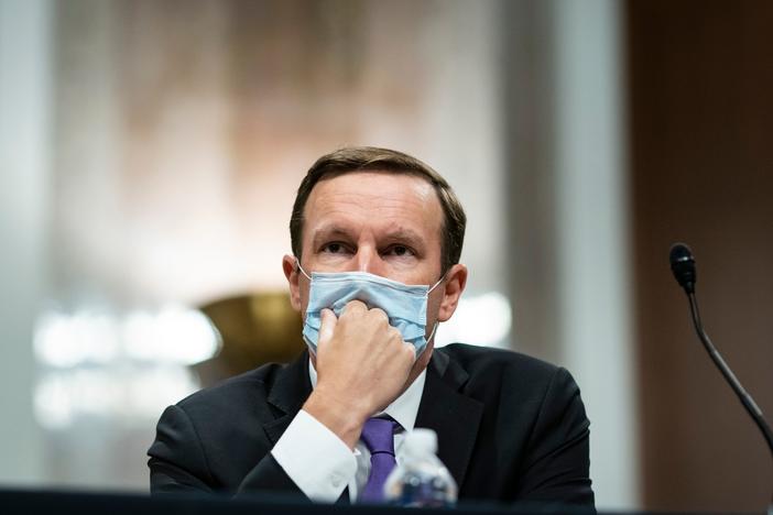 In his new book, Sen. Chris Murphy, D-Conn., <em></em>outlines the history of the Second Amendment and why gun violence is as bad as it is today. Above, Murphy listens during during a Senate hearing on June 30, 2020.