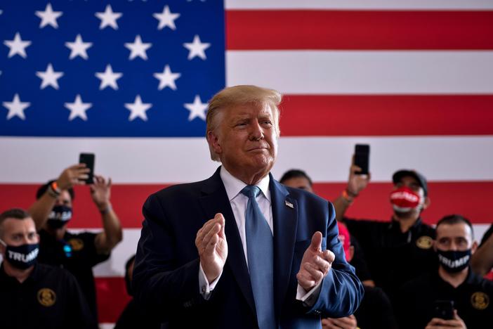 President Trump arrives for a rally at Yuma International Airport in Yuma, Ariz., on Aug. 18. Arizona has seen its share of white residents without a college degree drop. Meanwhile, its share of Latinos has risen.