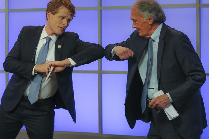 Rep. Joe Kennedy III (left) bumps elbows with Sen. Ed Markey after their Democratic Senate primary debate on June 1 in Springfield, Mass.