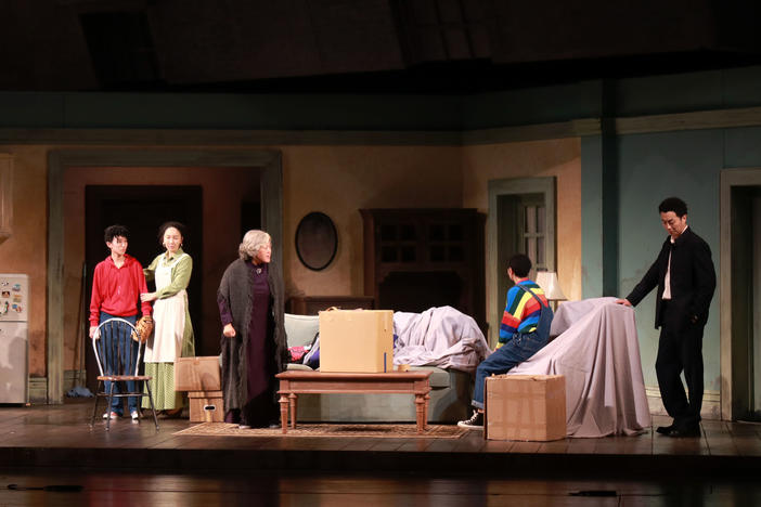 The cast of the Beijing People's Art Theatre production of <em>A Raisin in the Sun</em> rehearse onstage this past August.