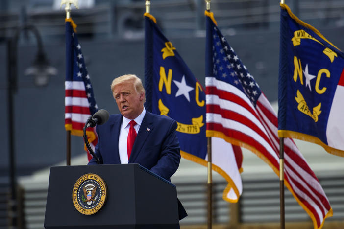 President Trump visited Wilmington, N.C., on Wednesday and urged supporters to try to vote in person after sending in a mail-in ballot — actions that would be both illegal and disruptive.