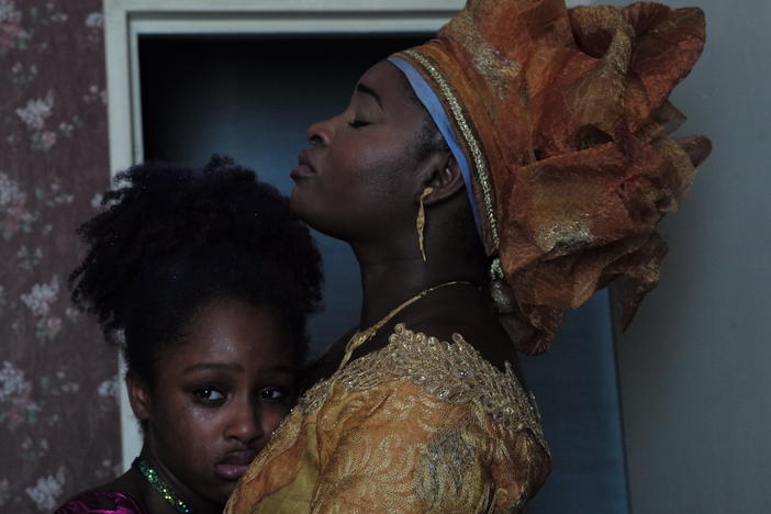 Amy (left), played by Fathia Youssouf, and her mother Mariam, played by Maïmouna Gueye, in a still from the film, <em>Cuties</em>.