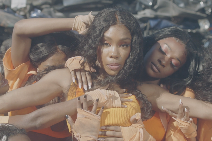 A screenshot from SZA's video for "Hit Different," featuring Ty Dolla $ign and The Neptunes.