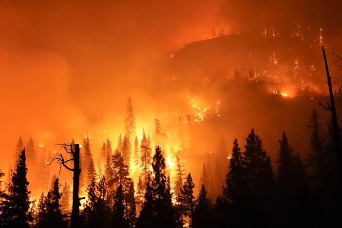 The Creek Fire burns in the Sierra National Forest on Sunday.