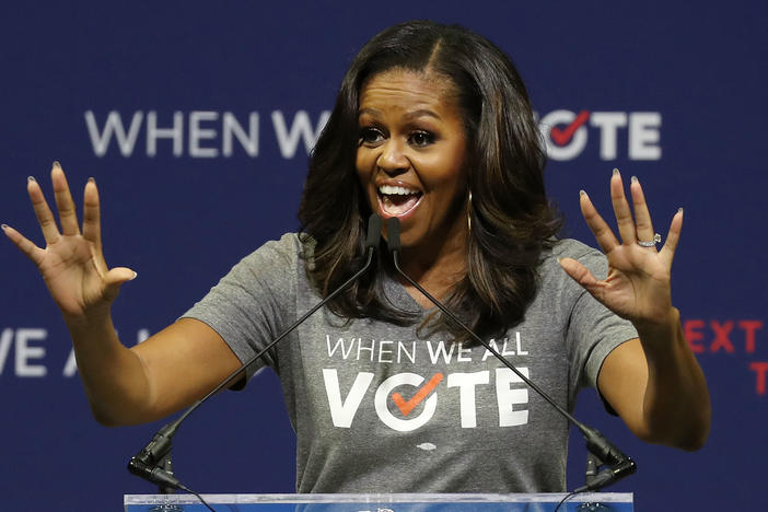 Former first lady Michelle Obama, seen here at a rally in 2018, is the founder of When We All Vote, an organization that aims to help people register and vote.