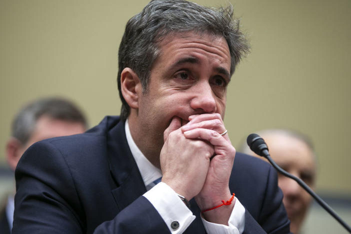 Michael Cohen, former personal lawyer to President Trump, listens to closing statements during a House Oversight Committee hearing in February 2019.