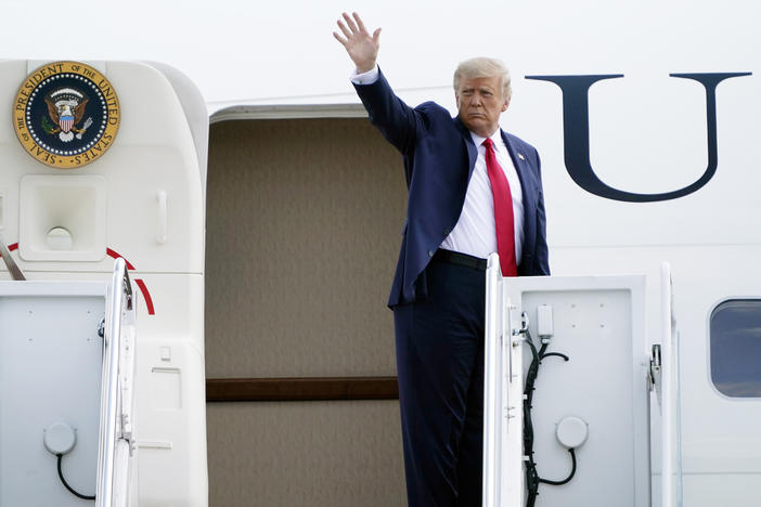 President Trump boards Air Force One on Tuesday at Andrews Air Force Base in Maryland.