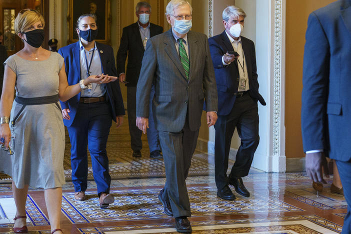 Senate Majority Leader Mitch McConnell of Ky., center, introduced a targeted coronavirus relief bill and said he planned a vote this week on it.