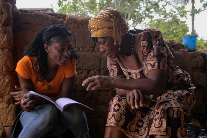 Rosine Mbakam (left) and her mother on the set of 'The Two Faces of a Bamiléké Woman,' which represents their intergenerational differences.