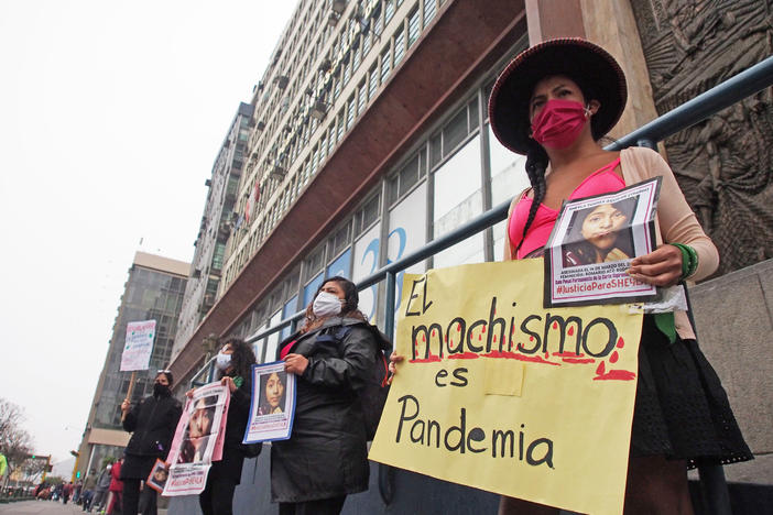 Demonstrators in front of the prosecutor's office in Lima, Peru, protest gender violence and femicide on June 20.