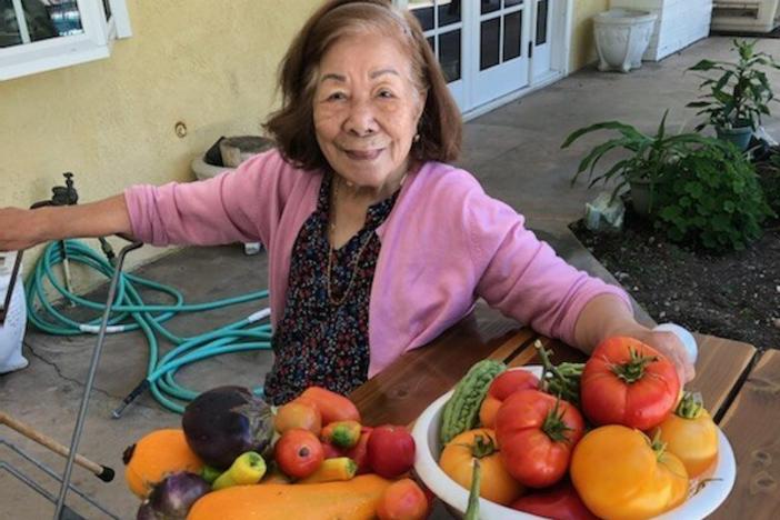 The author's grandmother, Felisa Mercene, 92, with the summer harvest from her son's garden in La Mirada, Calif.