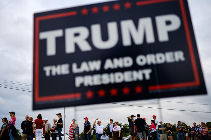 Supporters of President Trump line up outside of Arnold Palmer Regional Airport to get into a Sept. 3 rally in Latrobe, Pa.