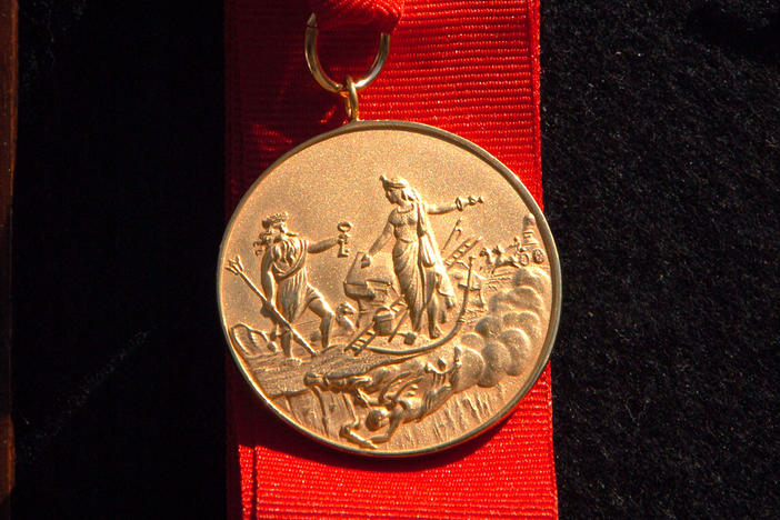 The New York City Fire Department's James Gordon Bennett Medal was established in 1869 and features an image of Neptune (left) wading ashore. It will be renamed the Chief of Department Peter J. Ganci, Jr. Medal.